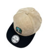Gorra plana beige corduroy-negro